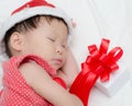 Sleeping baby girl Santa Claus Royalty Free Stock Photo