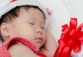 Sleeping baby girl Santa Claus Royalty Free Stock Photo