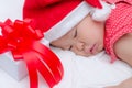 Sleeping baby girl Santa Claus Royalty Free Stock Photo