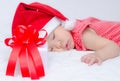 Sleeping baby girl Santa Claus Royalty Free Stock Photo