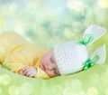 Sleeping baby in hare or rabbit hat Royalty Free Stock Photo