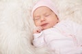 Sleeping Baby, New Born Kid Sleep in Fur, Beautiful Newborn Infant close up Portrait Royalty Free Stock Photo