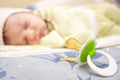 Sleeping baby and pacifier close. Royalty Free Stock Photo