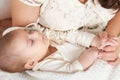 Sleeping baby portrait in mother hand, happy maternity and childhood concept Royalty Free Stock Photo