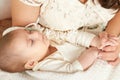 Sleeping baby portrait in mother hand, happy maternity and childhood concept Royalty Free Stock Photo