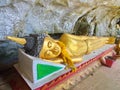 Sleeping Buddha sculpture in the cave , Travel in Vang Viang Cit Royalty Free Stock Photo