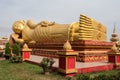 Sleeping buddha statue at Wat Pha That Luang Temple in Vientiane, Laos Royalty Free Stock Photo