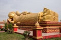 Sleeping buddha statue at Wat Pha That Luang Temple in Vientiane, Laos Royalty Free Stock Photo