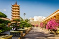 Sleeping buddha and tall pagoda temple of Vinh Trang in My Tho. (Ho Chi Minh City, Vietnam - 2/01/2020