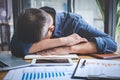 Sleeping Businessman, Tired senior businessman sleeping having long working day overworked on table in his office Royalty Free Stock Photo