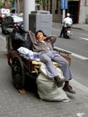 Sleeping in the busy streets of Shanghai China