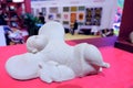 Sleeping child clay sculpture