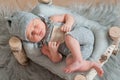 Newborn baby sleeping, asleep on bed