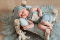 Newborn baby sleeping, asleep on bed