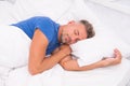 Sleeping guy at home. Relaxed man. Promote prevention and management of sleep disorders. World Sleep Day. Benefits of