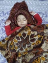 Sleeping Indian baby in winter season