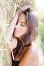 Sleeping lady on hay stack Royalty Free Stock Photo