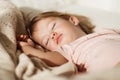 Sleeping little girl. Carefree sleep little baby with a soft toy Royalty Free Stock Photo