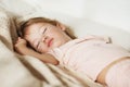 Sleeping little girl. Carefree sleep little baby with a soft toy Royalty Free Stock Photo