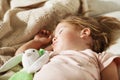 Sleeping little girl. Carefree sleep little baby with a soft toy Royalty Free Stock Photo