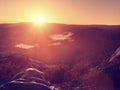 Sleeping in nature in sleeping bag. Beautiful awakening in rocks. View from rocky peak Royalty Free Stock Photo