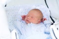 Sleeping newborn baby boy in a stroller Royalty Free Stock Photo