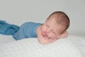 Sleeping Newborn Baby Boy Swaddled in Blue Royalty Free Stock Photo