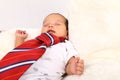 Sleeping newborn baby boy in tie Royalty Free Stock Photo
