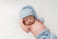 Sleeping Newborn Baby Boy Wearing a Sleeping Cap Royalty Free Stock Photo