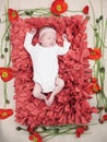 Sleeping Newborn Baby Girl flowers Royalty Free Stock Photo