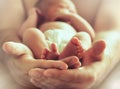 Sleeping newborn baby on male hands Royalty Free Stock Photo