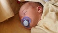 sleeping newborn baby with papilla 2