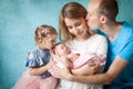 Sleeping newborn girl with her family Royalty Free Stock Photo