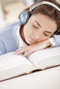 Sleeping on open book Royalty Free Stock Photo