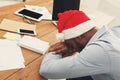 Sleeping overworking black businessman with laptop Royalty Free Stock Photo