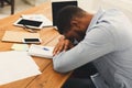 Sleeping overworking black businessman with laptop Royalty Free Stock Photo