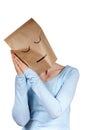 A sleeping paper bag head