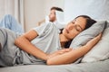 Sleeping, peace and woman asleep on bed with comfortable pillow while taking nap to relax with sleepless partner in Royalty Free Stock Photo