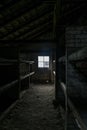 Sleeping quarters with wooden bunk beds showing prisoners terrible living conditions at The Nazi concentration camp of Royalty Free Stock Photo