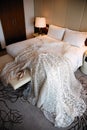 sleeping room, bed with white sheets, wedding dress lies on the bed, the brideÃ¯Â¿Â½s morning, the brideÃ¯Â¿Â½s wedding gatherings,