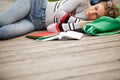 Sleeping student with Tablet and notebooks Royalty Free Stock Photo