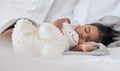 Sleeping, teddy bear and relax with baby in bedroom for cute, comfortable and dreaming. Innocence, young and rest with