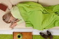 Woman sleeping on couch at home Royalty Free Stock Photo