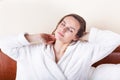 Sleeping woman in white bathrobe Royalty Free Stock Photo