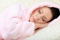 Sleeping young woman having her eyes closed Royalty Free Stock Photo