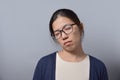 Sleepy Asian Glasses Woman.