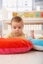 Sleepy baby on playmat