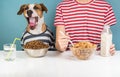 Sleepy dog and human having breakfast together. Minimalistic ill Royalty Free Stock Photo