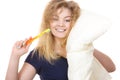 Sleepy happy woman hugging white pillow