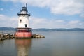 A horizontal view of the scenic Tarrytown Light, a sparkplug lighthouse on the east side